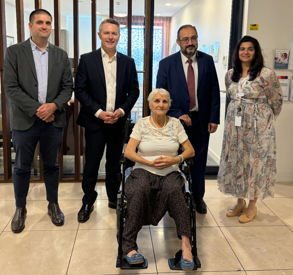 Gallipoli Health resident Sevim Muratoğlu Centre) with staff and Minister Jason Clare