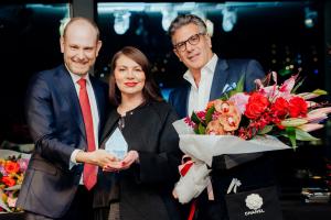 Faye Spiteri OAM receiving her award from Ageing Australia Chief Executive Officer Tom Symondson (left) and alongside Fronditha Care Chairman Kostas Livadaras.