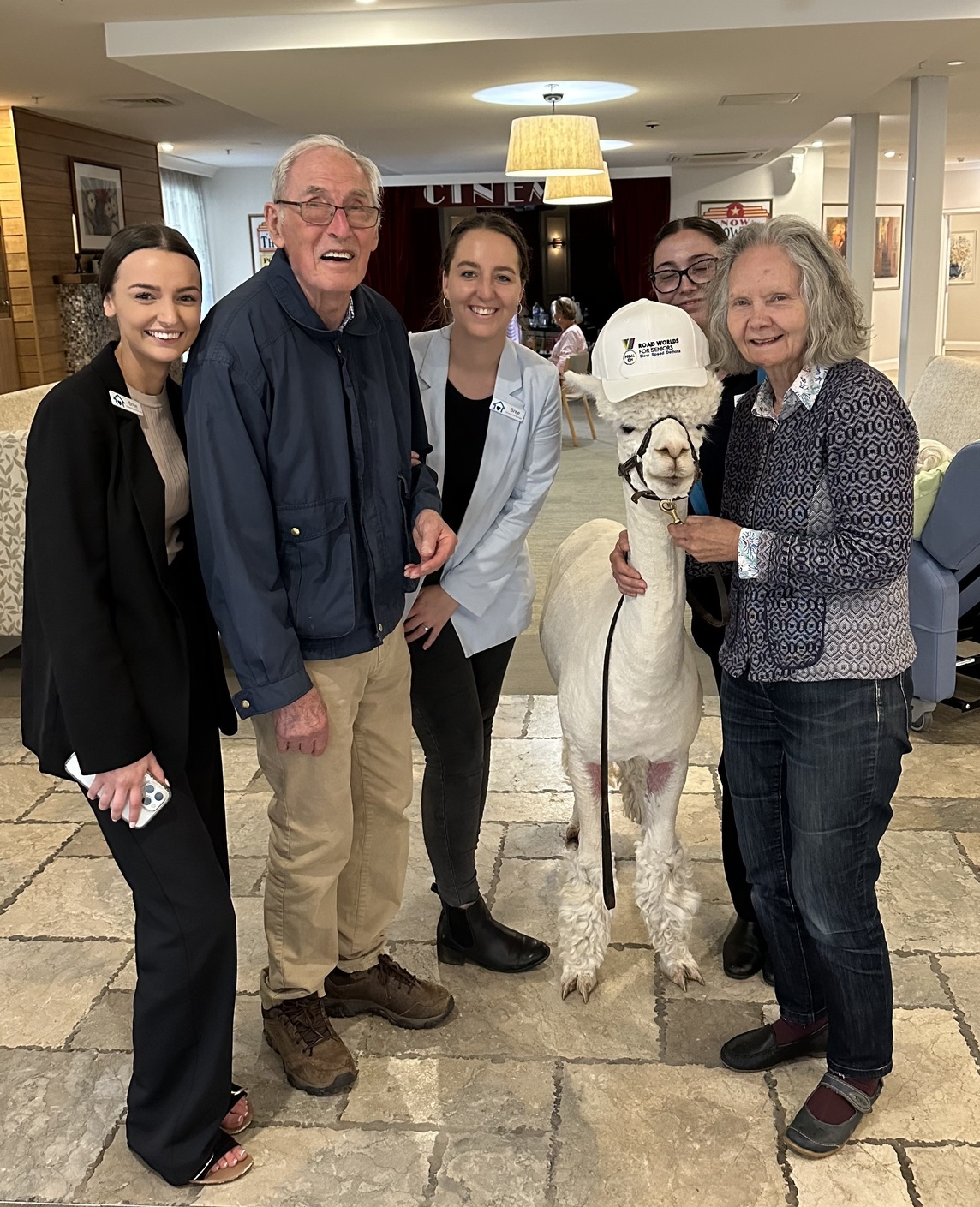 L-R: Brianna Browne with Alistar Chalmers, Breannan Ciantar, Hephner the Alpaca and Susan Love.